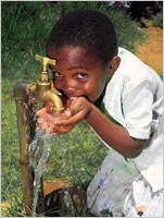 South African boy drinks clean water.