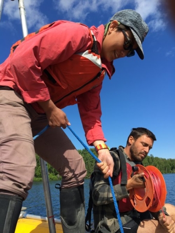 Annie Wong and David Fortin taking a Uwitec surface core at Sunken Island Lake