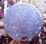 USGS benchmark at the corner of 4 sections